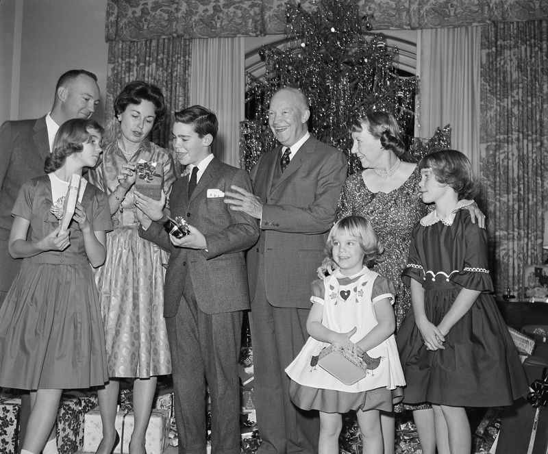 Illustration for article titled 70 Years of First Ladies Standing in Front of Christmas TreesÂ